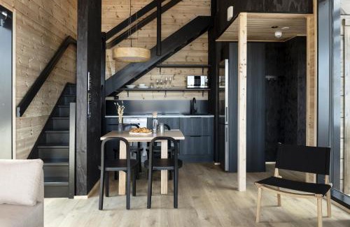 Kouvola Resort | Discover Tykkimäki Resort: Oceanfront Getaway with Hot Tub