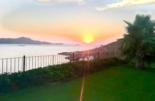 Dagbelen Apartment | Serene Oceanfront Retreat with Garden & Family-Friendly Perks