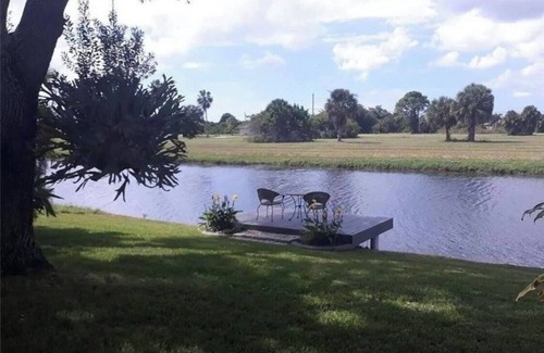 Pebble Beach House | Unforgettable Sunsets on Serene Canal with Private Dock