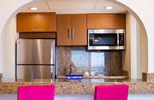Jimenez Condo | Breathtaking Views: 1 Bedroom Suite with Kitchen at Villa del Palmar Resort