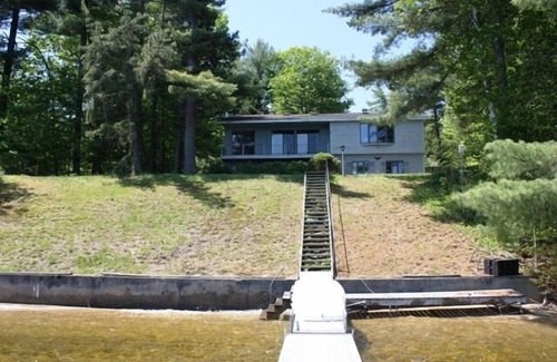 Sebago House | Experience Waterfront Bliss at Our Private Beach Lakehouse