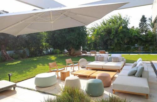 Herzliya Pituach Apartment | Elegant Villa with Pool & Sauna Steps from the Beach