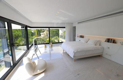 Herzliya Pituach Apartment | Elegant Villa with Pool & Sauna Steps from the Beach