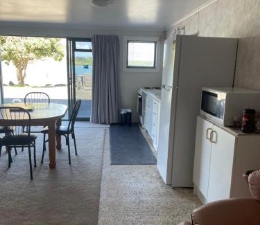 Parua Bay House | Cozy Breeze Inn with Oceanfront Views and Pet-Friendly Rooms