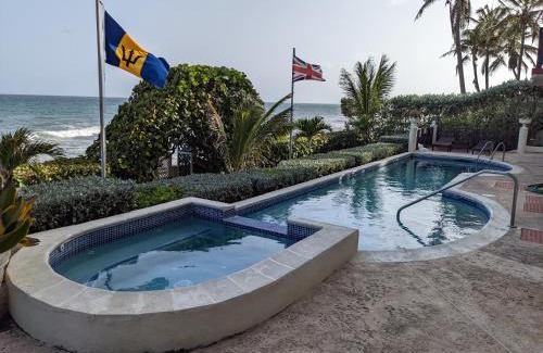 Oistins Apartment | Breezy Ocean Front Condo with Pool and Beach Access