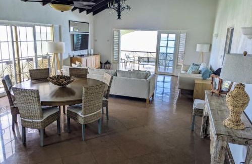 Oistins Apartment | Breezy Ocean Front Condo with Pool and Beach Access