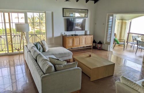 Oistins Apartment | Breezy Ocean Front Condo with Pool and Beach Access