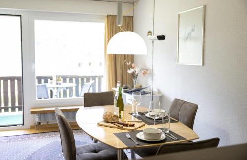 Engadin Scoul Apartment | Brentschpark 28: Pet-Friendly Retreat with Pool Access