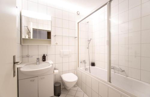 Engadin Scoul Apartment | Brentschpark 28: Pet-Friendly Retreat with Pool Access
