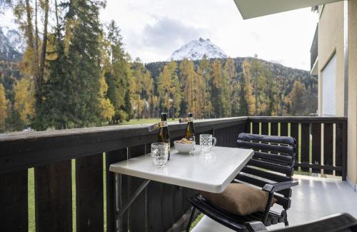 Engadin Scoul Apartment | Brentschpark Wohnung 72: Family-Friendly Retreat with Pool