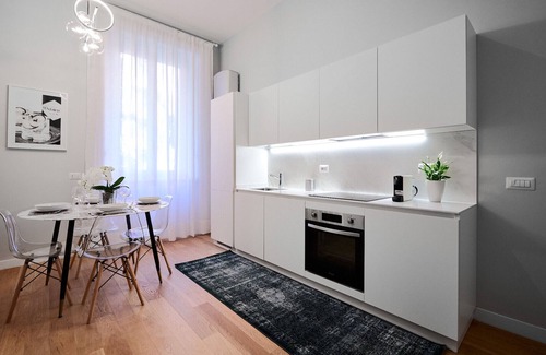 Porta Garibaldi Apartment | Elegant Brera Suite with Breakfast & Family Amenities