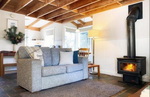 Newborough Cabin | Brigadoon Cottages: Family-Friendly Getaway with Kitchens