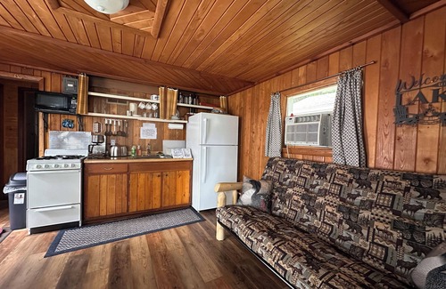 Pelican Lake Cottage | Bright 2 Bedroom Mackinac Cabin with Lake View & Boat Dock