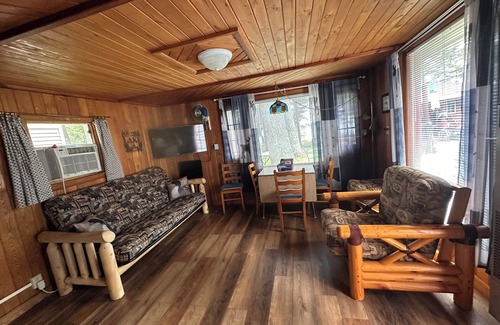 Pelican Lake Cottage | Bright 2 Bedroom Mackinac Cabin with Lake View & Boat Dock