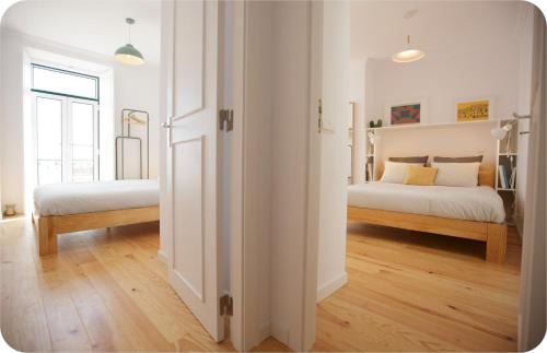 Santa Engracia Apartment | Bright 2BR w/Tagus View | By Airnest