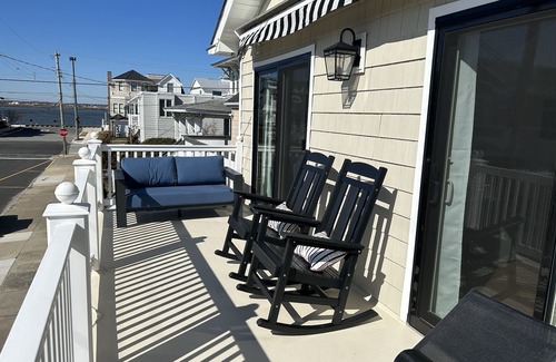Gardens Condo | Bright Beach Retreat with Spa and Scenic Bay Views