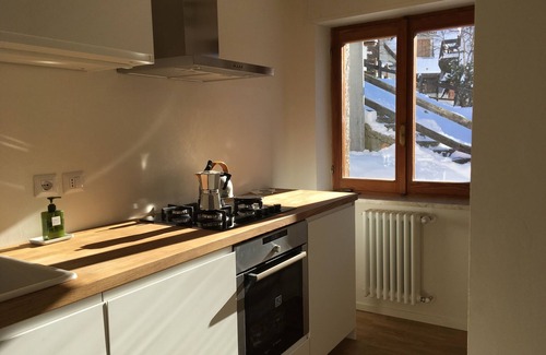 Paquier Apartment | Bright Apartment with Ocean View, Spa, and Large Balcony