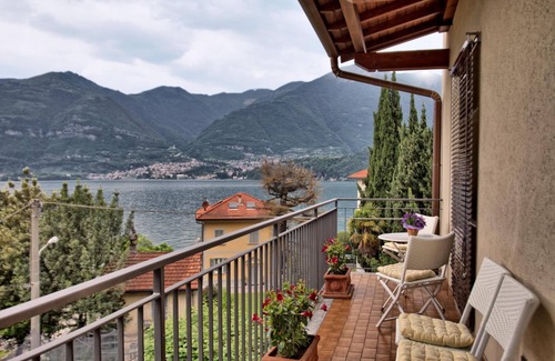 Lezzeno Apartment | Bright Beachfront Apartment with Pool & Ocean Views