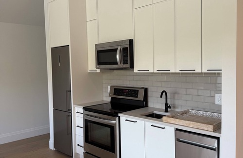 Westbank Apartment | Bright Beach Studio – Steps from Ocean Access | King Bed + Patio