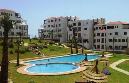 Cabo Negro Apartment | Bright Lilac's Garden Apartment with Ocean and Mountain Views