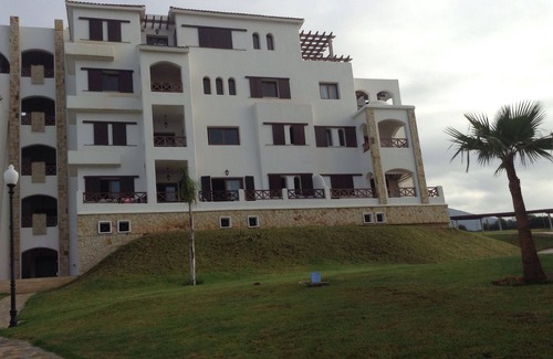 Cabo Negro Apartment | Bright Lilac's Garden Apartment with Ocean and Mountain Views