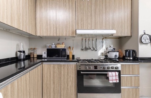 Bur Dubai Apartment | Bright & Cozy Retreat Near Metro with Pool and Gym