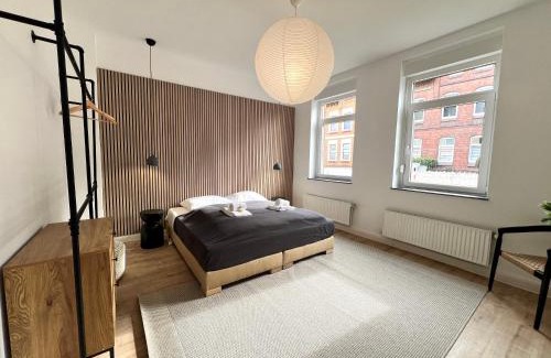 Hildesheim District Apartment | FLATLIGHT: Stylish Apartment with Kitchen & Netflix Access