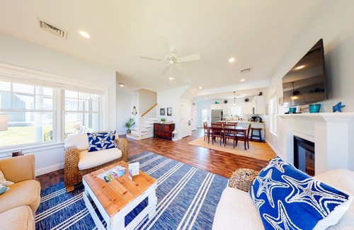 Arundel Cottage | Modern Coastal Retreat with Pool, Game Room & Gym Access