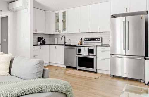 Parkside Condo | Modern King Suite with Pool | Steps from Creekside Trail