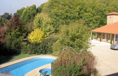 Bright Hotel | Bright on Track: 4-Star Getaway with Pool and Spa