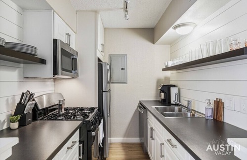 Triangle State Apartment | Inviting Pool View Apartment with Private Cabanas Await