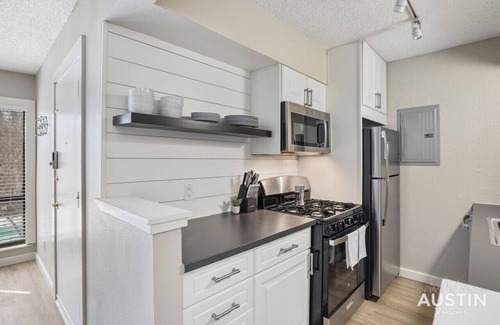 Triangle State Apartment | Inviting Pool View Apartment with Private Cabanas Await