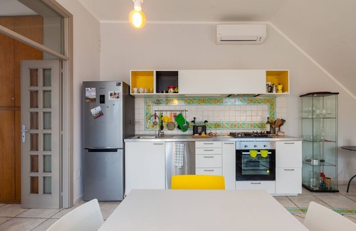 Vittorio Emanuele Apartment | Bright Rooftop Retreat by Napoliapartments: Rated 9/10
