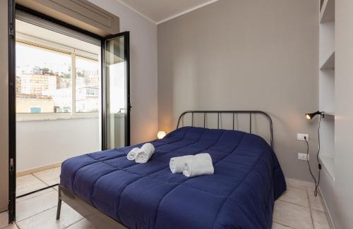 Vittorio Emanuele Apartment | Inviting Oceanfront Retreat at Bright Rooftop by Napoliapartments