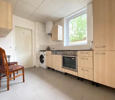 Liesing Apartment | Bright & Spacious 3BR Apt with Direct City Access
