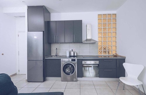 Gibraltar Apartment | Contemporary 2BR in Zoko with Spa and Family-Friendly Amenities