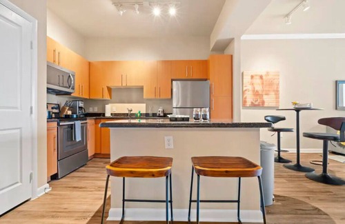 Cityplace Apartment | Bright Uptown Apartment with Enormous Balcony & Pool Access