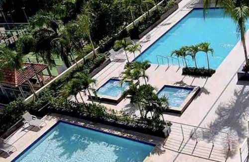 Juan Dolio - El Pueblo Apartment | Relaxing Yellow Touch: Beach, Pools, Gym & Ocean Views