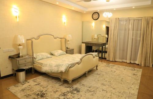 D.H.A. Villa | Britania Designer Villa: Family-Friendly Retreat with Pool