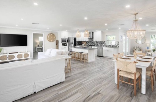 St. Petersburg House | Broadwater Gem: Poolside Retreat with Private Boat Dock