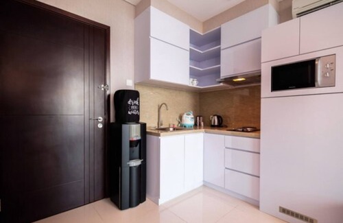 Tangerang Apartment | Brooklyn Alam Sutera Studio: Family-Friendly Stay with Pool