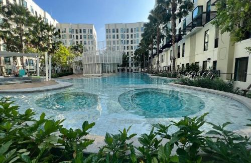 Bang Na Apartment | Relax at unio72: Oceanfront Pool with Family-Friendly Vibes