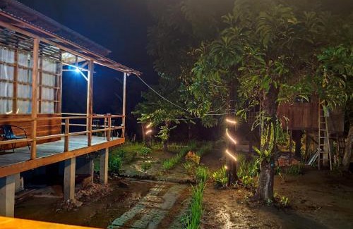 Batang Serangan House | Discover Bua Guesthouse Tangkahan: Pet-Friendly Retreat