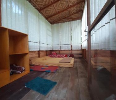 Batang Serangan House | Discover Bua Guesthouse Tangkahan: Pet-Friendly Retreat