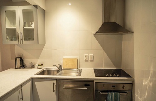 Tawa Hotel | Cozy Bucket Tree Lodge with Breakfast & Family-Friendly Vibes