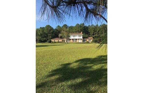 Thomasville House | Tranquil BuckHaven Countryside Retreat with Fishing Pond