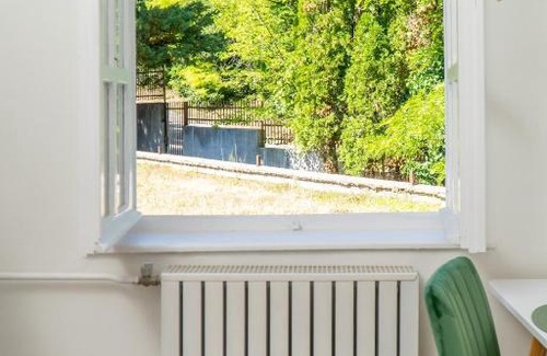 Farkasvolgy Apartment | Experience Comfort at Budai Zöldövezet Apartmanház
