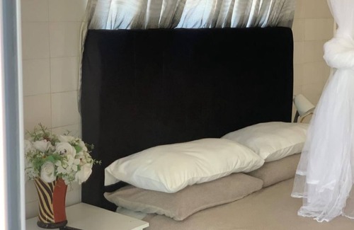 Harare Cottage | Budget Pad at No. 105 by Ekhaya