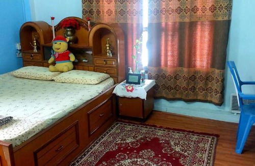 Manigram House | Budget-Friendly Rooms in Convenient Location for Families