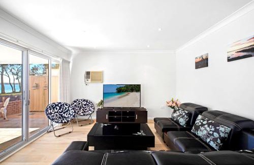 Budgewoi House | Serene Lakeview Retreat in Budgewoi for Families